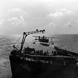 Scoutplane being hoisted on board USS&nbsp;Philadelphia