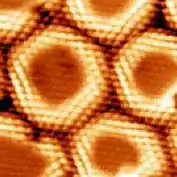 Boron Nitride Nanomesh observed by STM at 77K.