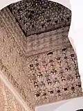 Partial view of the muqarnas vault in front of the mihrab