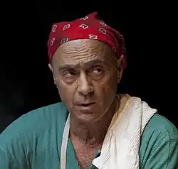 Salim Daw performs in a theatrical production