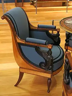 Armchair of the salon of Juliette Récamier; attributed to Jacob Frères; c.1798; various types of wood; 84.5 x 62.2 x 62&nbsp;cm; Louvre[76]