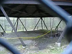 The site under its protective shelter