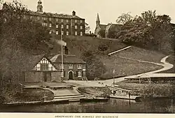 The current main school building and a since replaced boat house in 1908