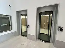 Security portals with BR3 rated glass and steel construction for ballistics and burglary protection with handwave biometric readers in a data center environment