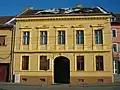 Neoclassical building with eyes (Sibiu)