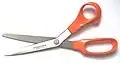 Orange of Fiskars scissors