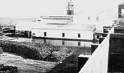 Roaster and acid plant, with stockpile (1900)