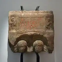 Funerary stele of a couple, with epigraphic cartridge held by two Cupids. Middle of the 3rd century. Found in Dachstein
