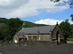 Small stone-built church in a graveyard