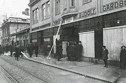 Saint Petersburg storekeepers protect their stores during the revolution (1917).