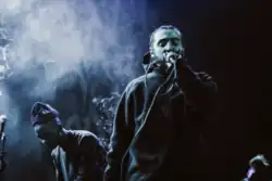 Gio Escobar (right) and Jasper Marsalis (left) performing with Standing On The Corner in 2018.