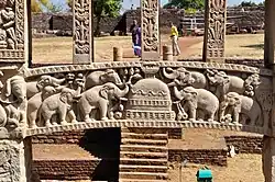 A bas-relief of the Ramagrama stupa, from the east gateway of Great Stupa at Sanchi, in Raisen District of the State of Madhya Pradesh, India