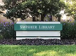 Swisher Library entrance sign