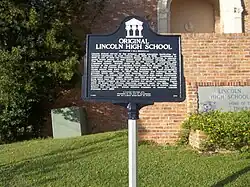 A historical marker titled "Original Lincoln High School"