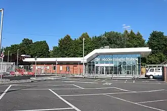 The new glass-fronted station building, opened 2020.