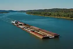 Towboat Dakota Storm upbound on Ohio River at Matthew E. Welsh Bridge (1 of 4), near Mauckport, Indiana, USA, 1987