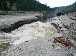 Rapids on Trout River, from Mackenzie Highway 61°8′42″N 119°50′46″W﻿ / ﻿61.14500°N 119.84611°W﻿ / 61.14500; -119.84611
