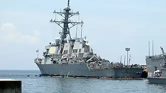 Rear view of Paul Hamilton at Manila Port Harbor