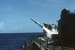 An RGM-84A Harpoon antiship cruise missile is fired from a Mark 11 launcher aboard the guided missile destroyer USS&nbsp;Lawrence