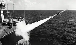Mount Whitney launches a RIM-7 Sea Sparrow missile in 1976.