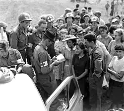 Black-and-white photo of U.S. troops in Orléans, August 19, 1944