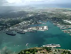 An aerial view of ships moored at Pearl Harbor during Rim of the Pacific (RIMPAC) Exercise 2004.