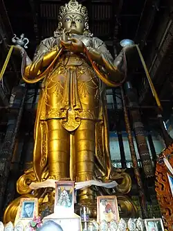 Statue of Avalokiteśvara (Migjid Janraisig) in Gandantegchinlen Monastery, Ulaanbaatar, Mongolia. The tallest indoor statue in the world, 26.5-meter-high, 1996 rebuilt (1913)
