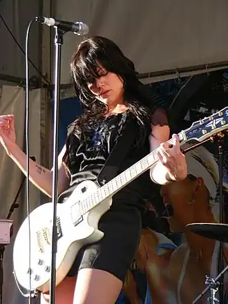 Amorosi performing live in 2008