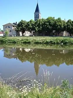 The Arroux river and church in Vendenesse-sur-Arroux