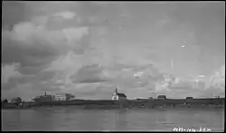 Providence Mission Indian Residential School showing new Roman Catholic Mission on the left, circa 1930