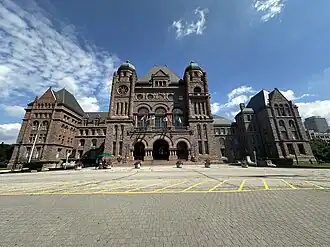 View of the front of the Ontario Legislative Building in July 2024