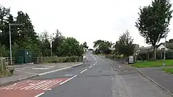 A paved road with pavement markings.