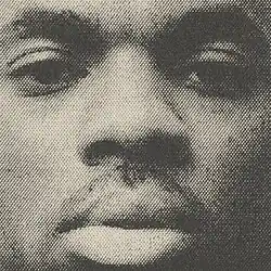A grainy black & white image of Vince's face