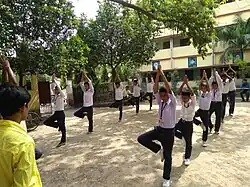 Vivekananda Kendra Students Practicing Yoga Exercise - To Improve physical & Mental Stability