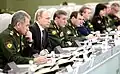 Vladimir Putin with the leadership of the Ministry of Defense and General Staff along with other Russian generals at a meeting in the National Defense Management Center