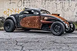 Volksrod with a chopped top modified to look like a rat rod