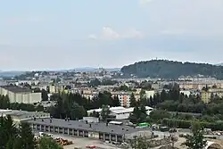 View of the district from the hill in Trepcza in 2024, with Downtown in the background