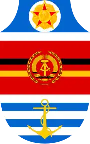 The coat of arms of the People's Navy with the Order of Karl Marx (1956–1990)