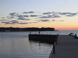 People fishing from the pier at Weborg Point