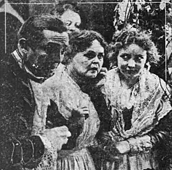 Black and white photograph showing actors in period costume in the film