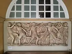 Inside the loggia of the Museum, with a cast of Donatello's Cantoria for Florence Cathedral