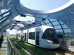 A tram in Wuhan University Science Park (Wudayuan) Station, one of the few elevated stations of the system