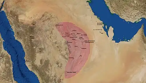 A satellite map of central Arabia and historic settlements, with a specified region shaded in red