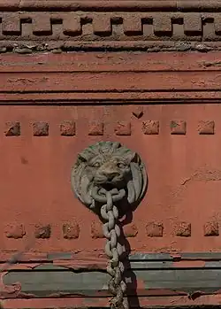 Lion supporting the canopy over the Columbus Avenue sidewalk
