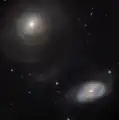 NGC 470 with neighbor NGC 474.[6]