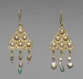 Pair of Byzantine earrings; 7th century; gold, pearls, glass and emeralds; 10.2 by 4.5 centimetres (4.0&nbsp;in ×&nbsp;1.8&nbsp;in); Cleveland Museum of Art (Cleveland)