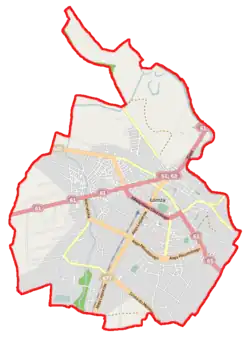 Mapa konturowa Łomży, blisko centrum na dole znajduje się punkt z opisem „Łomża”