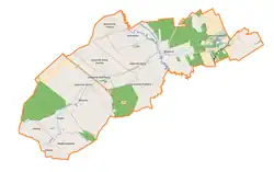 Mapa konturowa gminy Łopiennik Górny, blisko centrum na lewo znajduje się punkt z opisem „Łopiennik Nadrzeczny”