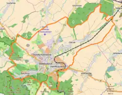 Mapa konturowa Świebodzic, blisko centrum na dole znajduje się punkt z opisem „Świebodzice”