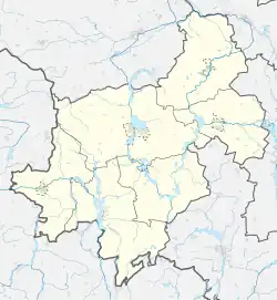 Mapa konturowa powiatu żnińskiego, blisko prawej krawiędzi znajduje się punkt z opisem „Piechcin”